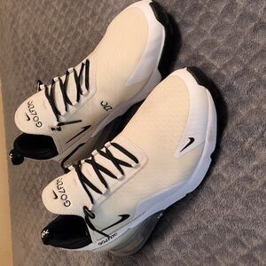 Men's Nike shoes white in color with black accents in size 13.